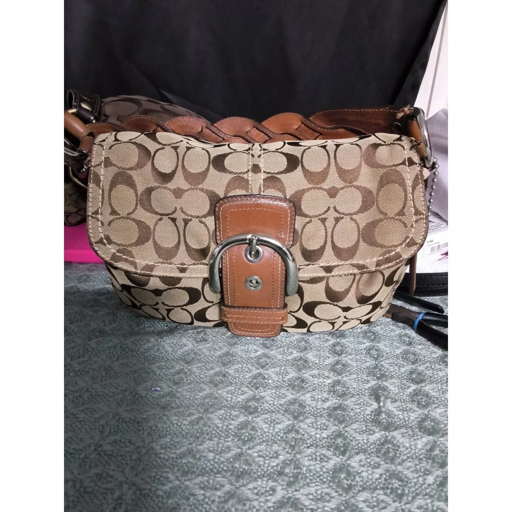 93.Coach Soho Signature shoulder bag
